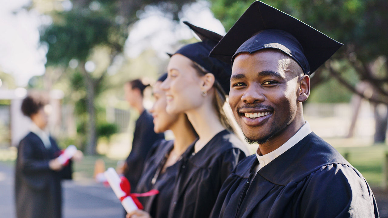 Portrait university student, black man and graduation celebration, event and achievement of goals, education success and motivation. Happy, excited and smile african college graduate celebrate future